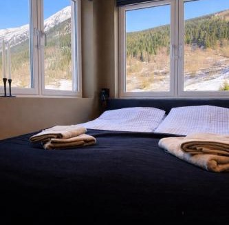 Odda Apartment | Trolltunga Stay - Mountain & Waterfall View