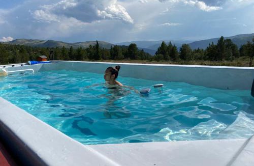 Dovre Villa | Trollvang, hytte med pool og sauna