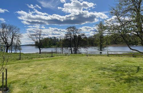 Sollebrunn Villa | two-story house with lake view