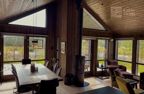 Svingvoll House | Unique cabin with fantastic lake view, sauna, ski & EV outlet