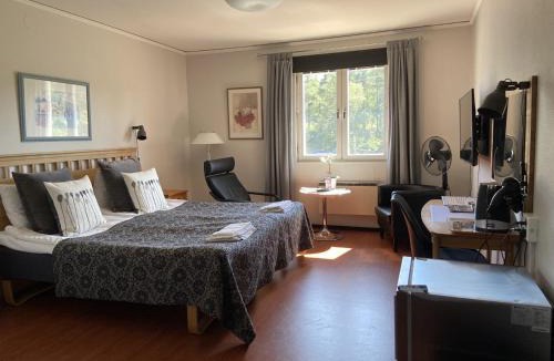 Vastra Hudiksvall Hotel | Värdshuset Glada Hudik