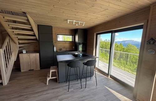 Sogndal Ski Chalet | Vidsyn Hodlekve: Panoramic views, playful modern design, cinema & foosball
