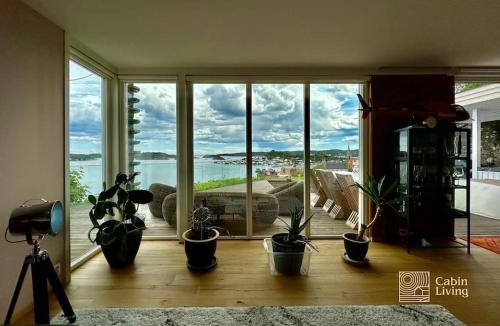 Kragero Villa | Villa in Kragerø with unique view, jacuzzi, boat space & outdoor kitchen