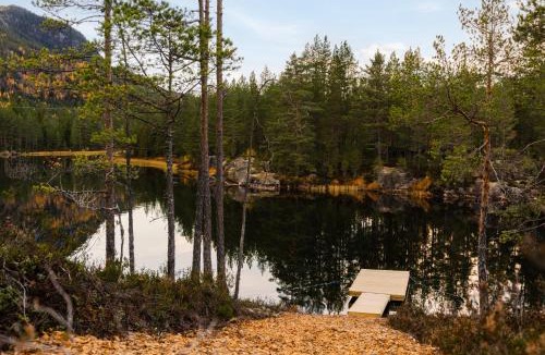 Kviteseid Ski Chalet | Villa Lakehouse Moss with sauna, boat & jacuzzi