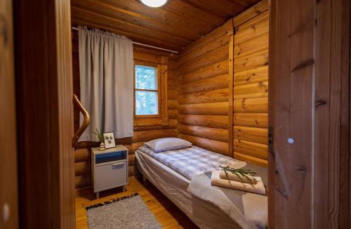 Kuusamo House | Villa Tilhi - Cozy 2BR Cabin with Sauna & Fireplace