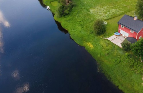 Vindeln House | Vindelstugan · Riverside Cottage on the Wild Vindel River