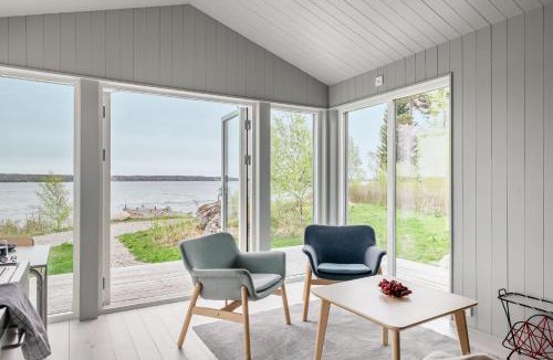 Resaro House | Waterfront home with private beach in Vaxholm