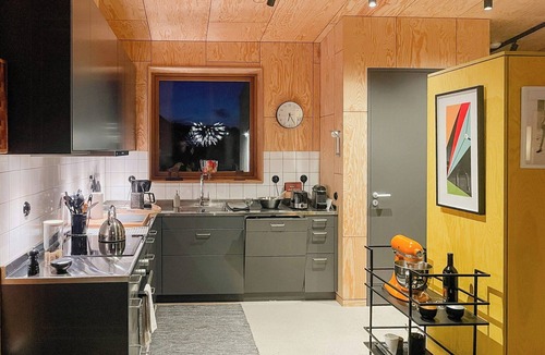 Kivik House | Wooden home among apple trees with ocean view