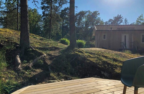 Nynashamn House | Wooden house with three patios on Torö