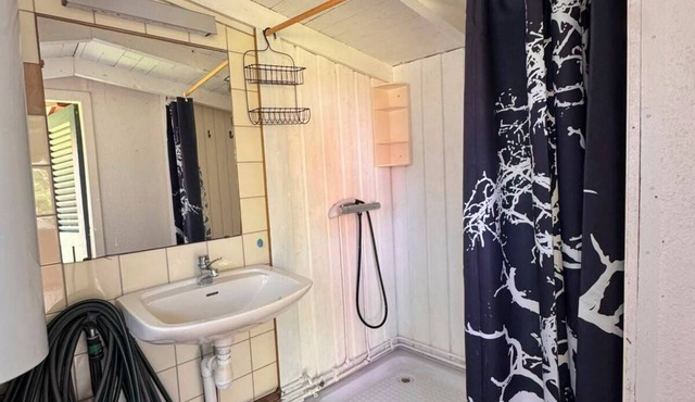 A simple summer cottage located about 200 m from a fantastic sandy beach.