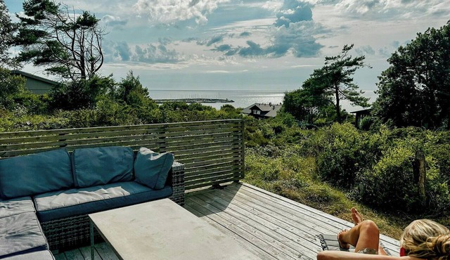 Architect-designed cottage where sea meets forest in Haverdal