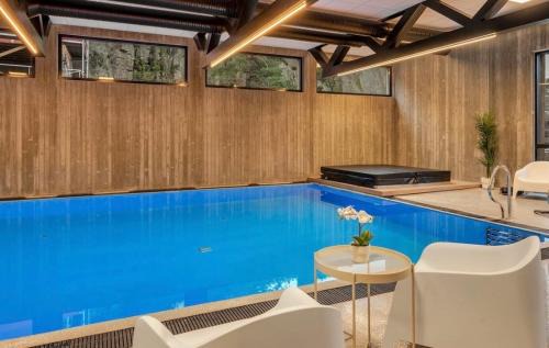 Åros Beach Cabin with Pool, Jacuzzi and Sauna