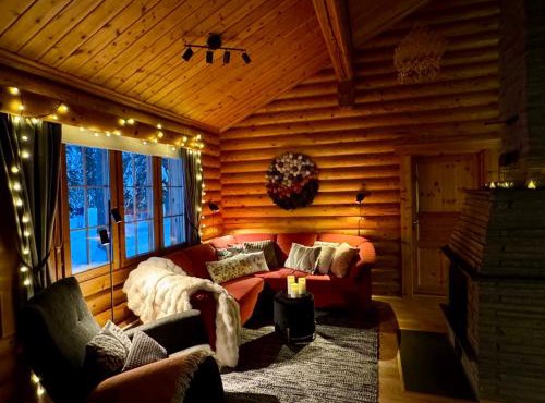 Atmospheric log cabin by the ski tracks
