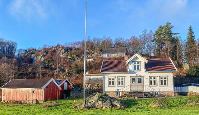 Beach front home in Farsund with WiFi