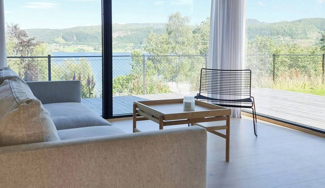 Cabin by the fjord with rooftop terrace on Randøy