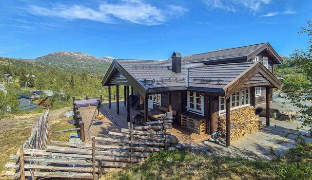 Cosy cabin with jacuzzi right by the ski slope