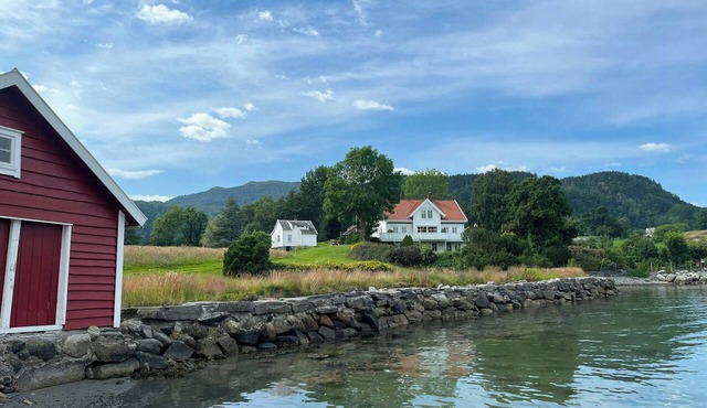Fjord views with private jetty and boathouse