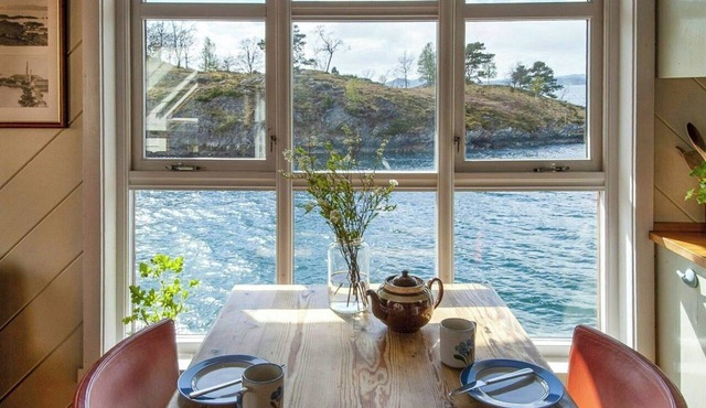 Historic salting house by the fjord near Bergen
