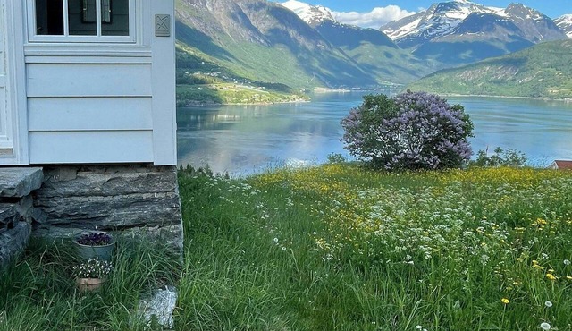 Historic timber house from the 1800s in Nordfjord in Olden