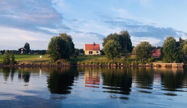Lakefront house with a sauna, private dock, and rowboat