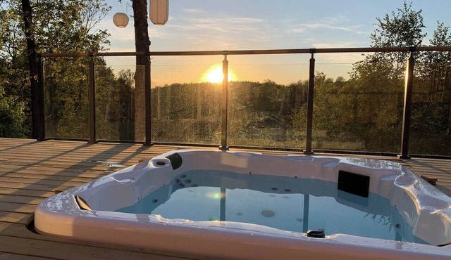 Log cabin with hot tub and views