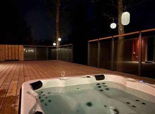 Log cabin with hot tub and views