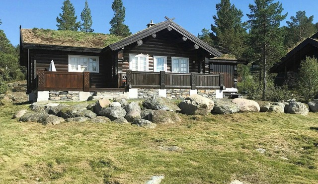 Log cabin with turf roof near Rauland