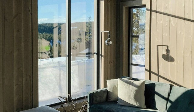 Modern cabin by Skeikampen's ski trails in svingvoll