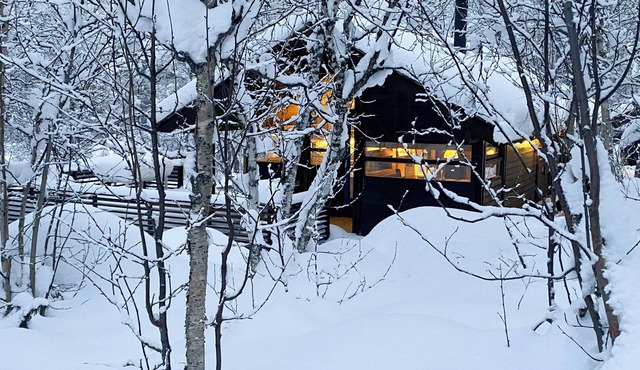 Modern mountain cabin near hiking terrain