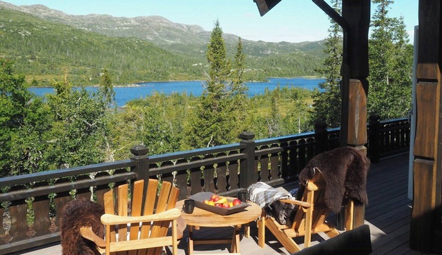 Modern mountain cabin with a view over the sea