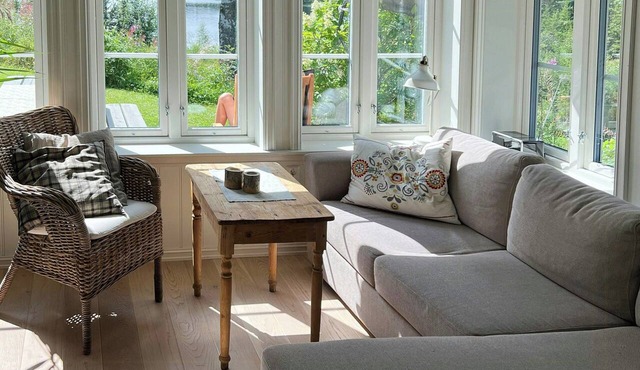 Peaceful cabin by lake with beach access in Aurskog