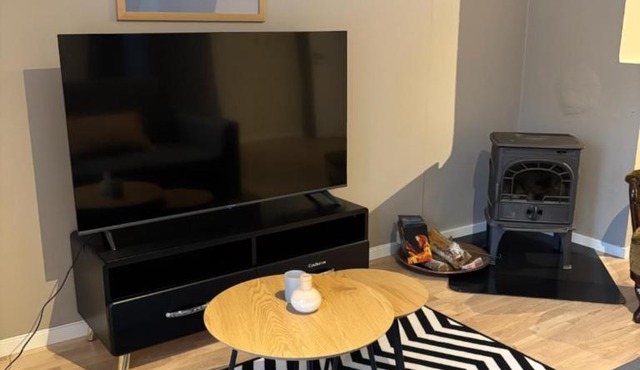 Sentralt i Raufoss-3 soverom, opptil 5 gjester, parkering og stor hage