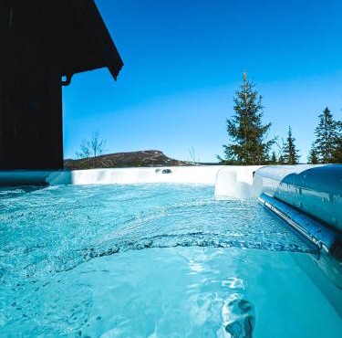 Skeikampen cabin with mountain view, jacuzzi, and 8 bedrooms