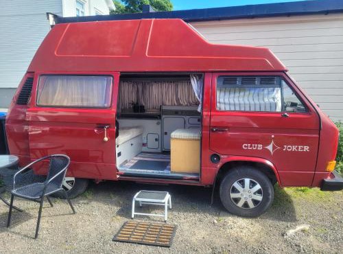 Sleep inside a classic Volkswagen Westfalia or our legendary Mercedes Düdo overland cabin in central Svolvær Close to public showers and toilets