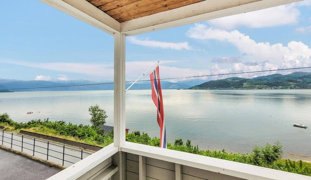 Spend an unforgettable vacation by the fjord in this comfortable vacation home.
