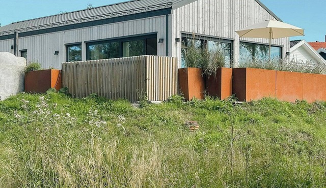 Sunlit coastal cottage with a grand terrace in Strömstad