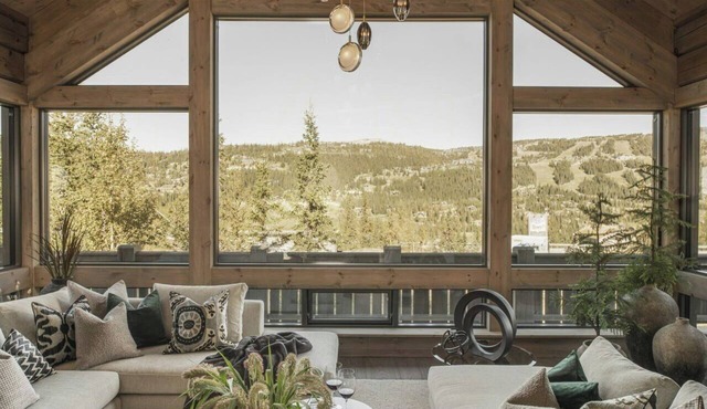 Timber cabin with ski slope and sauna