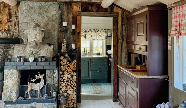 Traditional cabin in beautiful mountain setting