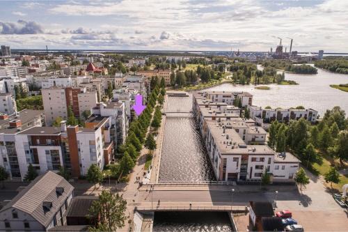 Unique seaside 2-bedroom apartment with private yard, sauna & free garage parking in Oulu