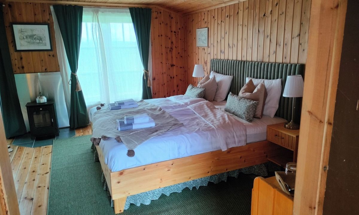 Arjang Bed & Breakfast | Charming B&B mixed farm with an unique, cozy cottages with a fantastic view.