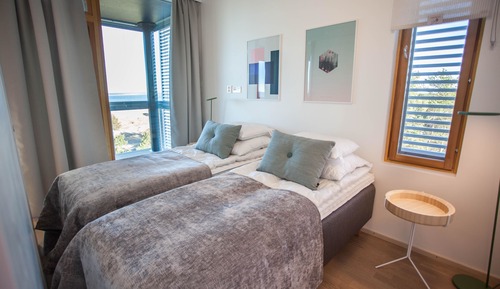 Apartment for four with a sauna and sea view