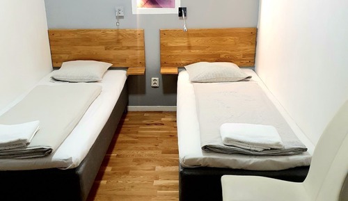 Twin Room, No Windows (shared bathroom)