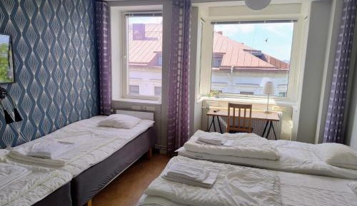 Quadruple Room with Shared Bathroom