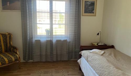 Single Room with Shared Shower and Toilet