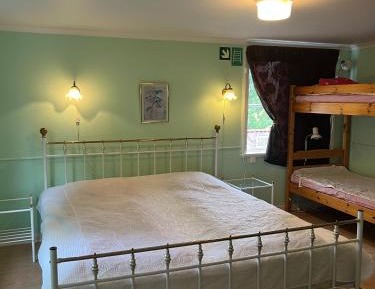 Quadruple Room with Shared Bathroom