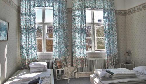 Quadruple Room with Shared Bathroom