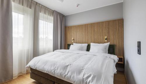 Family Room with One King Bed and One Wall Bed - Non-Smoking