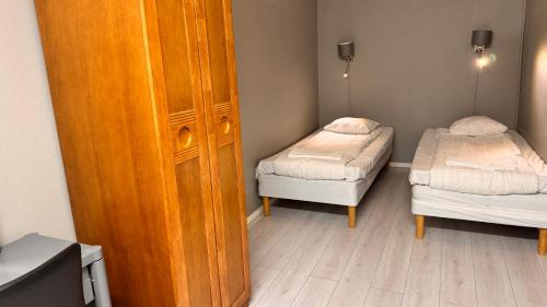Twin Room with Shared Bathroom without Window