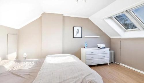 Three-Bedroom Apartment with Balcony