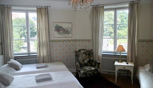 Economy Quadruple Room with Shared Bathroom